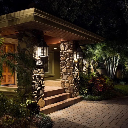 Modern residential landscape lighting installation by First Coast Landscape Lighting